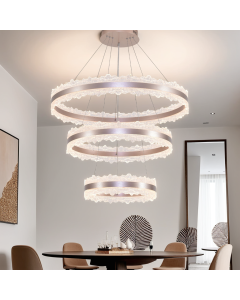 Triple-ring chandelier with a golden crystal design. 
